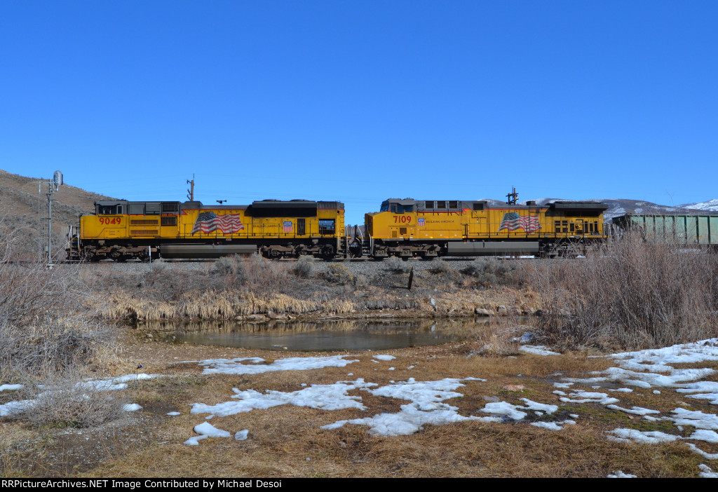 UP 9049, 7109 (SD70ACE, C44ACM) lead a westbound manifest at the Weber River Access Area in Henefer, Utah. February 19, 2022 {Winter Echofest}